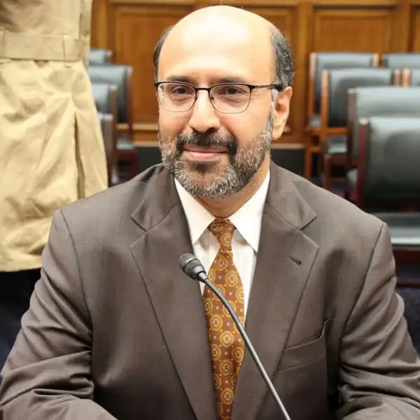 Portrait placeholder for Dr. Hassan Abbas